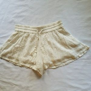 Free with $20+ purchase. Free People white shorts